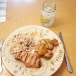 Delicious grilled pork chops paired wirh roasted red potatoes and my favorite co…