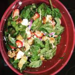 Delicious light Strawberry Spinach Salad with Chicken after enjoying the first b…