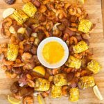 Homemade shrimp boil at the beach house on a rainy night. We loved it so much we…