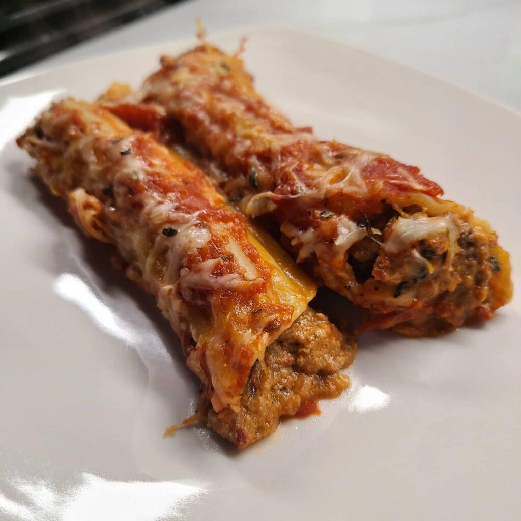 Manicotti stuffed pasta 

Gotta work on making my dishes neater, but everything …