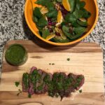 Medium rare steak chimmichurri and a simple orange spinach radicchio and walnut …