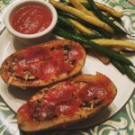 Paleo-ish pizza potato skins. Because  This version packs much of the flavor wit…
