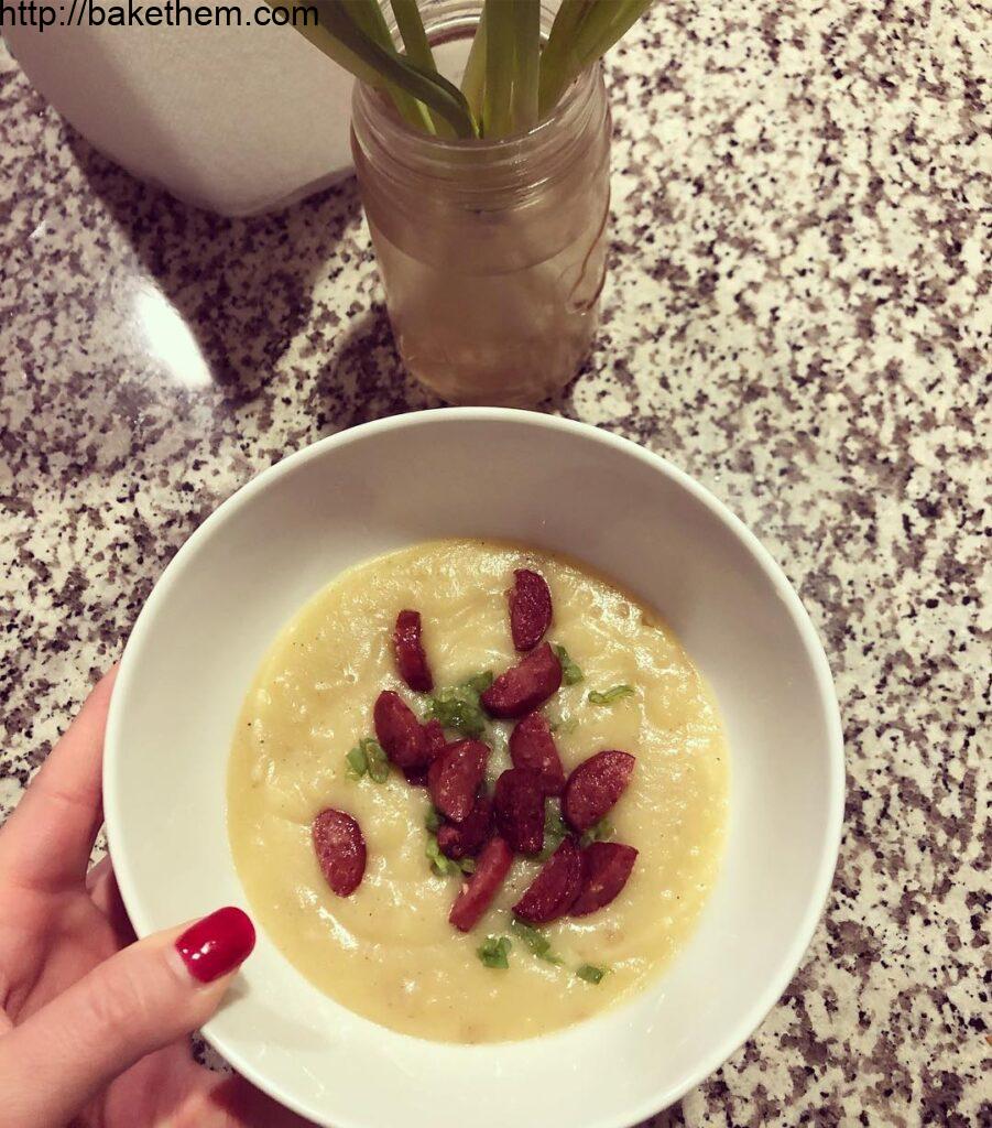 Potato bisque topped with kielbasa and chives. This was as delicious as it was q…