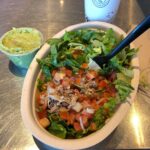 Whole30 Chipotes bowl: carnitas, lettuce, extra mild salsa, and guac. It was suc…